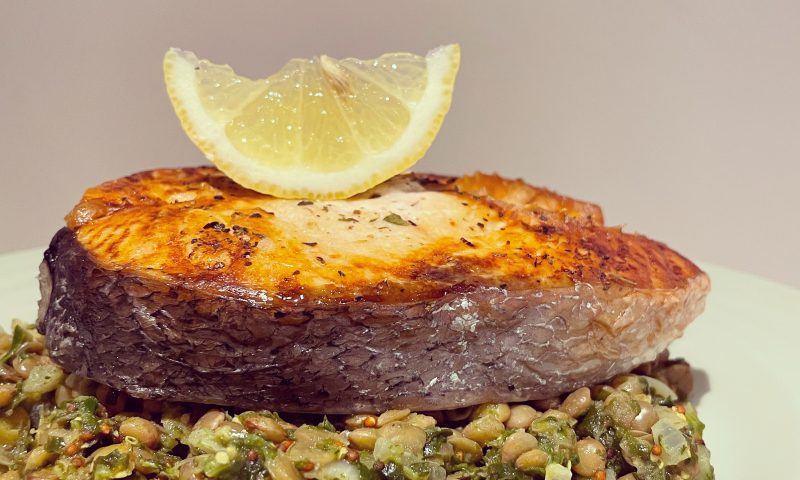 Salmon with lentils and wholegrain mustard sauce.